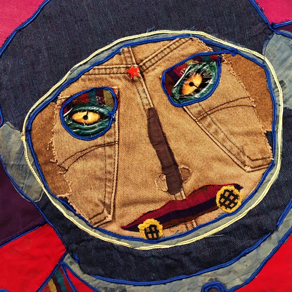 Надежда Эверлинг — Космонавт. Фрагмент (ткань, полиэтилен, наклейка от бутылки Coca-Cola), 1996